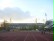 Ein Sportplatz mit der Signal-Iduna-Halle im Hintergrund.