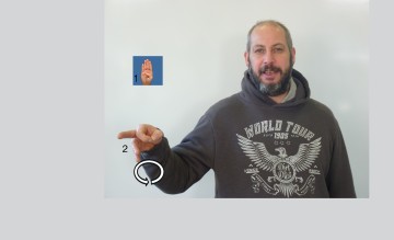 Porträtfoto und Namensgebärde Uwe Baedorf